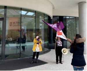 An image of NTEU Monash staff at a rally outside the Monash Chancellory building